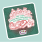 Cover of 'The Cosy Christmas Chronicles Colouring Book' with festive illustrations on a green background.
