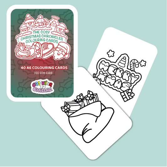 Cozy Christmas Chronicles colouring cards with a card holder on a light blue background