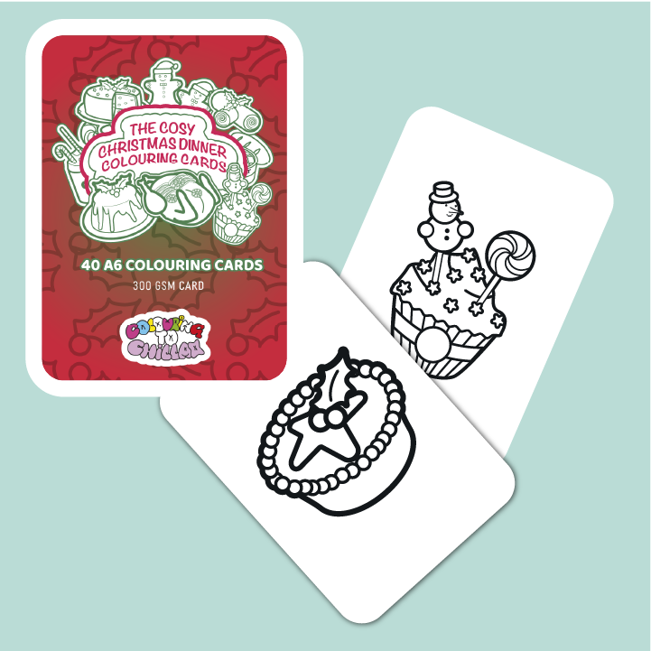 Coloring cards with Christmas-themed designs on a light blue background