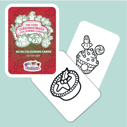 Coloring cards with Christmas-themed designs on a light blue background