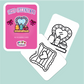 Coloring card with 'The Girlyest' design on a pink card and white card with black outline.